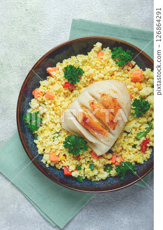 stuffed squid carcasses, baked in the oven, fried, with couscous, top view, homemade, no people, 126864291