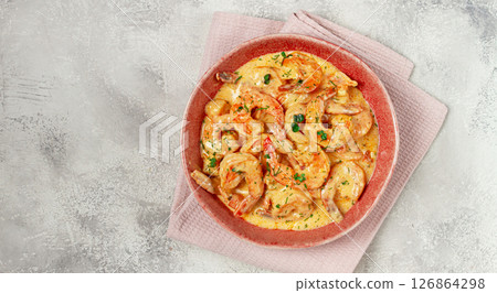 shrimp in creamy garlic sauce, with spices and herbs, 126864298