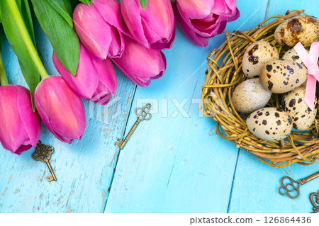 Spring background. A bouquet of tulips on a wooden background. Easter Spring background. A bouquet of tulips on a wooden background. Easter 126864436