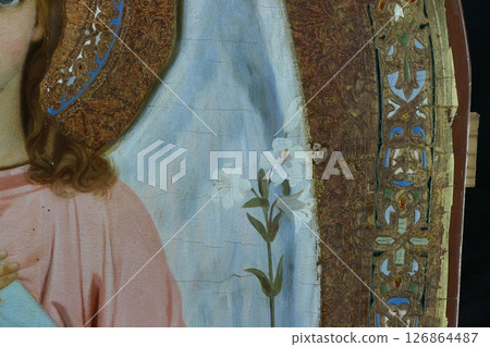 Restoration: close up of a painting final retouch 126864487