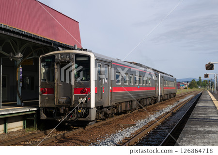 Kiha 54 series diesel railcar stopping at Nayoro Station on the Soya Main Line 126864718