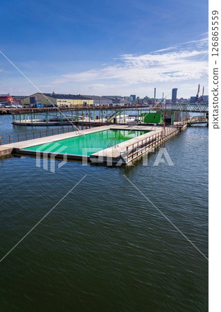 Floating swimming pools with sauna at Allmanna harbour bath in Frihamnen, Gothenburg, Sweden, sunny day 126865559