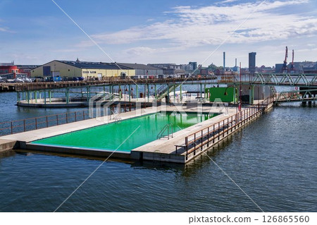 Floating swimming pools with sauna at Allmanna harbour bath in Frihamnen, Gothenburg, Sweden, sunny day 126865560