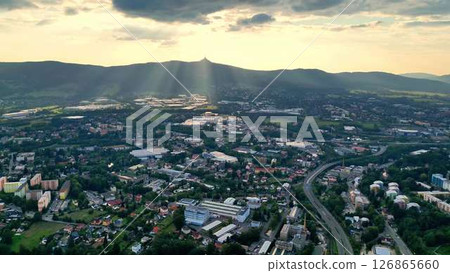 Stunning Aerial View of a Serene and Beautiful Landscape Illuminated by Sunlight Rays 126865660
