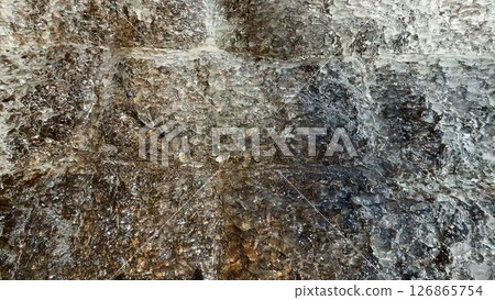 A Textured Surface Showcasing Variations of Dark and Light Shades and Tones in Detail 126865754