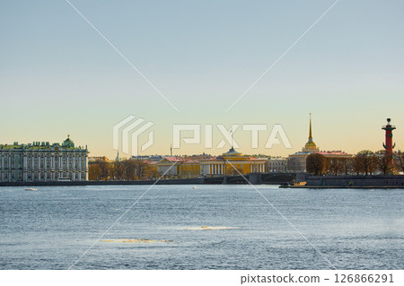 ice drift on the Neva River with a view of the arrow of Vasilyevsky Island with rostral columns, the Winter Palace, St. Isaac's Cathedral, the Savior on Spilled Blood ice drift on the Neva River with a view of the arrow of Vasilyevsky Island with rostral columns, the Winter Palace, St. Isaac's Cathedral, the Savior on Spilled Blood 126866291