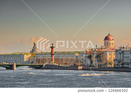 ice drift on the Neva River with a view of the arrow of Vasilyevsky Island with rostral columns, the Winter Palace, St. Isaac's Cathedral, the Savior on Spilled Blood 126866302