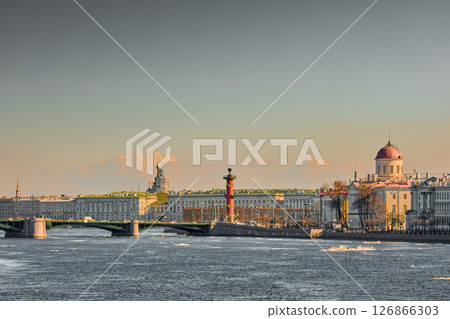 ice drift on the Neva River with a view of the arrow of Vasilyevsky Island with rostral columns, the Winter Palace, St. Isaac's Cathedral, the Savior on Spilled Blood ice drift on the Neva River with a view of the arrow of Vasilyevsky Island with rostral columns, the Winter Palace, St. Isaac's Cathedral, the Savior on Spilled Blood 126866303