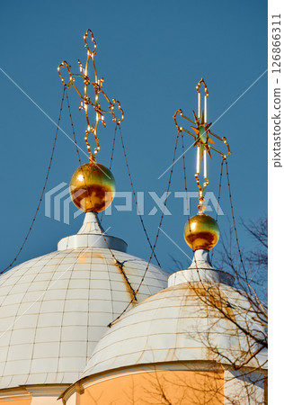 domes with golden crosses of the Prince Vladimir Cathedral on a sunny day domes with golden crosses of the Prince Vladimir Cathedral on a sunny day 126866311