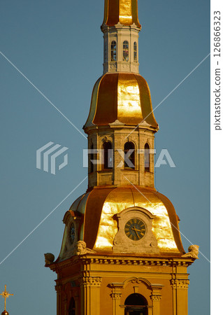 the Peter and Paul Fortress spire at sunset 126866323