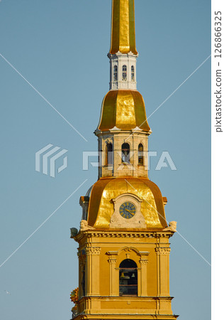 the Peter and Paul Fortress spire at sunset 126866325