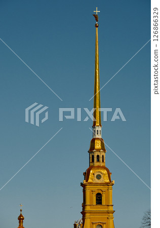 the Peter and Paul Fortress spire at sunset 126866329