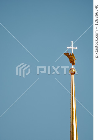 the Peter and Paul Fortress spire at sunset 126866340