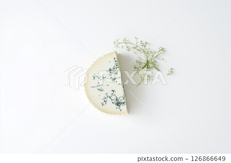 Blue cheese and herbs displayed as an elegant and gourmet culinary masterpiece Blue cheese and herbs displayed as an elegant and gourmet culinary masterpiece 126866649