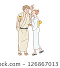 A couple in yukata happily eating and walking around 126867013