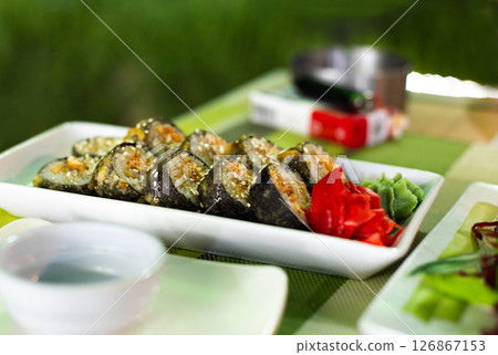 fresh delicious spring rolls served on the table fresh delicious spring rolls served on the table 126867153