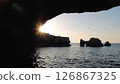 Seaside cave at dusk 126867325