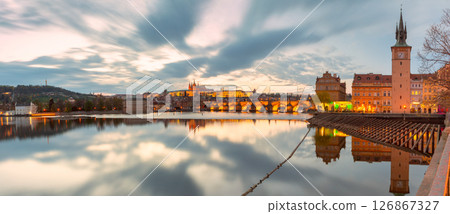 Vltava River and historic Prague at sunset in Prague Czech Republic Vltava River and historic Prague at sunset in Prague Czech Republic 126867327
