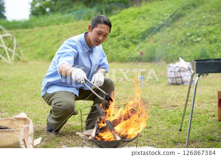 A master of fire and the outdoors 126867384