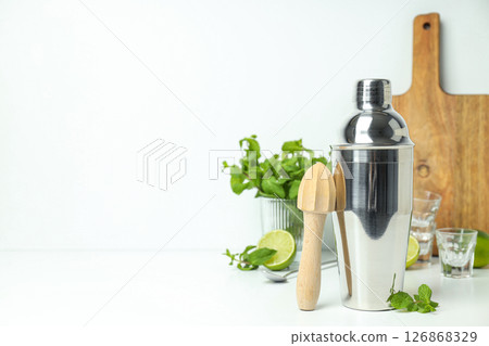 Metal shaker with fresh lime on a light background 126868329