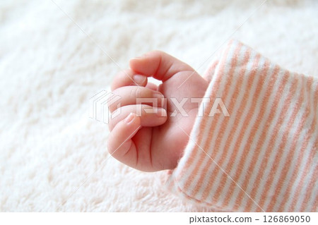 Baby's small hands (one month old) 126869050
