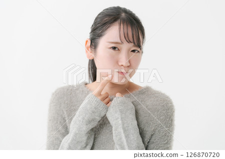 Women suffering from skin trouble 126870720