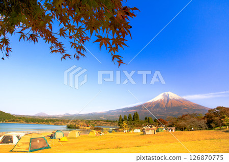 Image of a campsite in autumn: Mt. Fuji seen from Tanuki Lake Campsite with autumn leaves 126870775