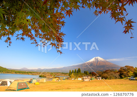 Image of a campsite in autumn: Mt. Fuji seen from Tanuki Lake Campsite with autumn leaves 126870776