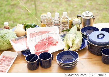 Camping food being prepared on the table 126870864