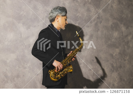 man blowing sax man blowing sax 126871158