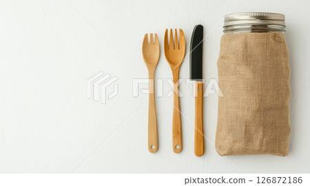 Eco-Friendly Zero Waste Concept with Bamboo Cutlery and Reusable Jar on White Background 126872186