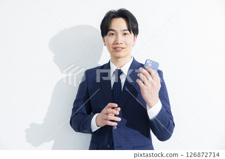 Businessmen using smartphones 126872714