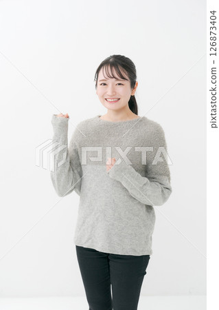 A woman doing a guts pose 126873404