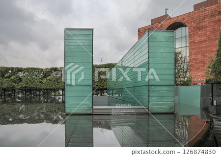 Modern Green Glass Memorial with Nature and Information Display March 28 2025 Modern Green Glass Memorial with Nature and Information Display March 28 2025 126874830
