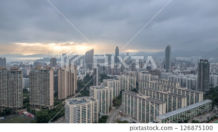 June 1 2025 Sunrise with High-Rises and Distant Mountain Scenery June 1 2025 Sunrise with High-Rises and Distant Mountain Scenery 126875100