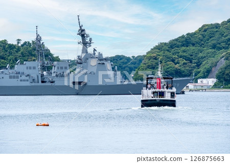A sightseeing boat departs for a tour of Yokosuka naval port. A sightseeing boat departs for a tour of Yokosuka naval port. 126875663