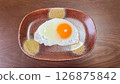 Beautiful soft-boiled fried egg served on a Japanese plate 126875842