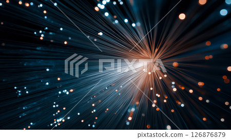Intense burst of orange and blue light from fiber optic cables symbolizing rapid data transmission 126876879