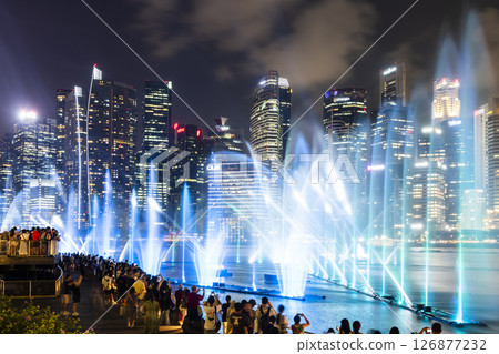 Beautiful view of the nightly music, water, and light show at Marina Bay Sands, here is an integrated resort fronting Marina Bay in Singapore. Beautiful view of the nightly music, water, and light show at Marina Bay Sands, here is an integrated resort fronting Marina Bay in Singapore. 126877232