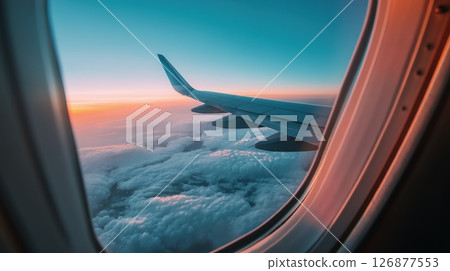Sunset Flight Above the Clouds 126877553
