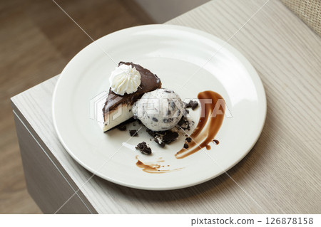 Chocolate cake with luscious cookie ice cream 126878158