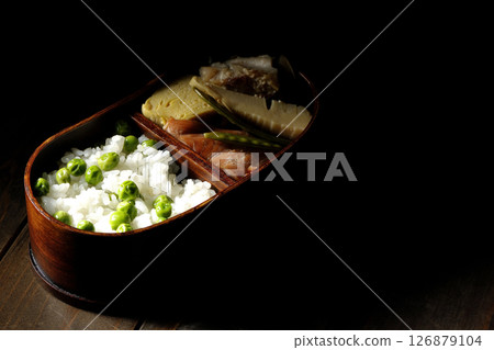 Bean and rice lunch box with plenty of side dishes 126879104