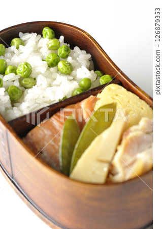 Bean and rice bento with plenty of side dishes photographed on a white background 126879353