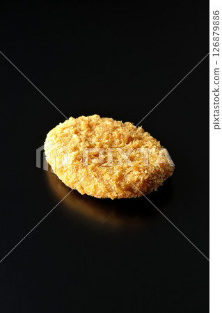 Beef croquette photographed against a black background Beef croquette photographed against a black background 126879886