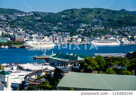 Cruise ship arriving at Nagasaki Port (Blue Dream Melody & Regatta) from the opposite shore [Nagasaki City] 126880294