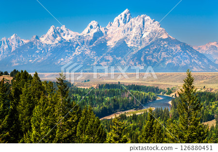 View of the Teton Mountain Range above the Snake River in Grand Teton National Park - Wyoming, United States 126880451