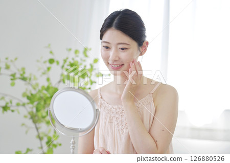 Woman beauty facial skin care at home 126880526