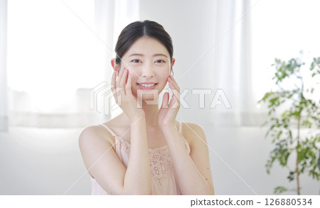 Woman beauty skin care camera looking at home 126880534