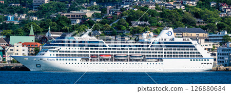 Panorama from the opposite shore of the passenger ship (Regatta) arriving at Nagasaki Port [Nagasaki City] 126880684
