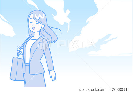 A refreshingly clear sky and a woman in a suit 126880911